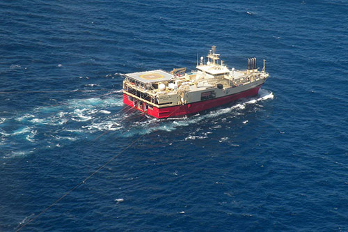 Seismic survey vessel with streamers deployed.